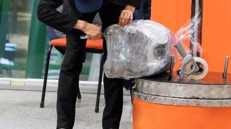 PAKISTANIS ANGERED BY NEW AIRPORT BAGGAGE WRAPPING POLICY