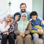 Happy family reunited in Saudi Arabia after receiving family visit visa - parents and children sitting together